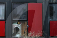 Families living in shipping containers