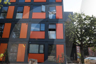 Families living in shipping containers