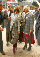 Anna Wintour Is Chic In Plaid Overcoat At PFW Before Turning 70 Next Month