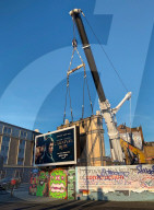 NEWS - Mauer mit Werk von Banksy wird mit Kran vor Zerstörung gerettet