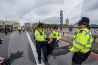Climate change activists from the Extinction Rebellion start a couple of weeks actions around the Houses of Parliament. They block and occupy roads around the Parliament and some chain themselves to a truck outside the Home Office.