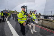 Climate change activists from the Extinction Rebellion start a couple of weeks actions around the Houses of Parliament. They block and occupy roads around the Parliament and some chain themselves to a truck outside the Home Office.