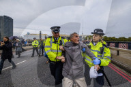 Climate change activists from the Extinction Rebellion start a couple of weeks actions around the Houses of Parliament. They block and occupy roads around the Parliament and some chain themselves to a truck outside the Home Office.