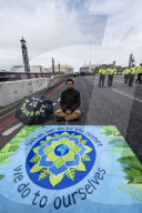 Climate change activists from the Extinction Rebellion start a couple of weeks actions around the Houses of Parliament. They block and occupy roads around the Parliament and some chain themselves to a truck outside the Home Office.