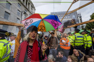 Climate change activists from the Extinction Rebellion start a couple of weeks actions around the Houses of Parliament. They block and occupy roads around the Parliament and some chain themselves to a truck outside the Home Office.
