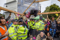 Climate change activists from the Extinction Rebellion start a couple of weeks actions around the Houses of Parliament. They block and occupy roads around the Parliament and some chain themselves to a truck outside the Home Office.