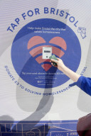 Bristol pioneers tap-to-donate scheme to help prevent homelessness .Contactless card readers across city centre will raise money for charities tackling crisis.