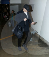 PREMIUM EXCLUSIVE Taron Egerton of 'Rocketman' Maintains Low Profile At LAX
