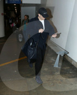 PREMIUM EXCLUSIVE Taron Egerton of 'Rocketman' Maintains Low Profile At LAX