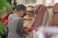 Gwen Stefani chills out gum and blows bubbles as she gets her nails done in Beverly Hills.