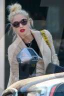 Gwen Stefani chills out gum and blows bubbles as she gets her nails done in Beverly Hills.