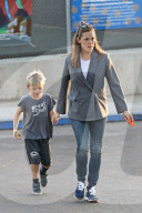 Jennifer Garner munches on a large carrot as she takes her and ex-husband Ben AffleckÍs son, Samuel, to a birthday picnic in Los Angeles.