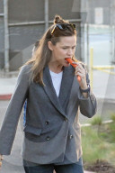 Jennifer Garner munches on a large carrot as she takes her and ex-husband Ben AffleckÍs son, Samuel, to a birthday picnic in Los Angeles.