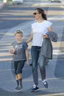 Jennifer Garner munches on a large carrot as she takes her and ex-husband Ben AffleckÍs son, Samuel, to a birthday picnic in Los Angeles.
