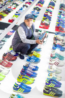 Sneaker fans clamour for designer’s lace-up tribute to home town. Limited-edition shoe launching at Adidas exhibition in Blackburn, part of British Textile Biennial.