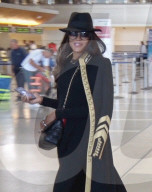 PREMIUM EXCLUSIVE Naomi Campbell Enjoys A Smoke Before Catching A Flight At LAX