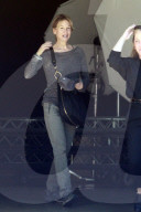 Renee Zellweger has a blast as she flirts with a handsome mystery man at a studio in Los Angeles. 