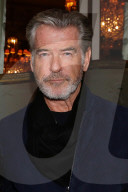 Pierce Brosnan Keely Shaye Smith leaving their hotel in Paris
