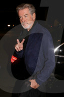 Pierce Brosnan Keely Shaye Smith leaving their hotel in Paris