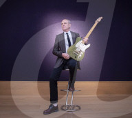 Francis Rossi of Status Quo with his famous green Fender Telecaster guitar .