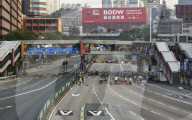 NEWS - Hongkong: Demonstranten legen weite Teile der Metropole lahm
