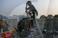 NEWS - Hongkong: Demonstranten legen weite Teile der Metropole lahm