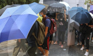 NEWS - Hongkong: Demonstranten legen weite Teile der Metropole lahm