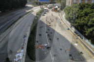 NEWS - Hongkong: Demonstranten legen weite Teile der Metropole lahm