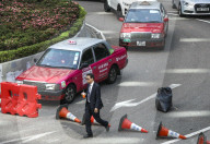 NEWS - Hongkong: Demonstranten legen weite Teile der Metropole lahm