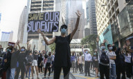 NEWS - Hongkong: Demonstranten legen weite Teile der Metropole lahm