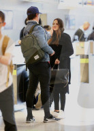 Hollywood actor Miles Teller and his model wife of two months, Keleigh Sperry, are deep in conversation as they catch a flight out of LAX. 