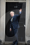 PM leaving Downing Street to meet the Queen