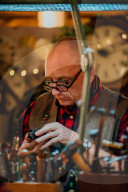 The Repair Shop. Expert craftsmen pool their talents and resources to restore heirlooms and treasured antiques such as music boxes, vases and clocks to prove that anything can be restored to their former glory.