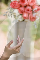 A bride tosses her bouquet
