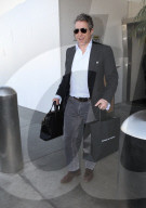 PREMIUM EXCLUSIVE Hugh Grant Lands At LAX After Voicing Support For Prince Harry