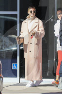 Hailey Baldwin in large beige coat