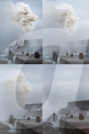 FEATURE -  Sturmtief Caira peitscht gischt in den Himmel am Leuchtturm von Porthcawl