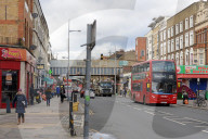 Kilburn is a down-to-earth multicultural district centred on busy Kilburn High Road, which is lined with mainstream stores, traditional pubs, and chain burger bars. Chinese, African, and Caribbean eateries serve the local community.