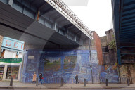 Kilburn is a down-to-earth multicultural district centred on busy Kilburn High Road, which is lined with mainstream stores, traditional pubs, and chain burger bars. Chinese, African, and Caribbean eateries serve the local community.