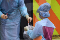 Staff in protective clothing at St Thomas' Hospital, London