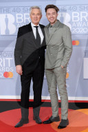 PEOPLE - Brit Awards: Promis auf dem Roten Teppich