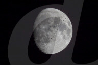 ISS crosses the moon