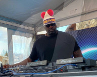 Shaquille ïShaq' O'Neal is seen paying tribute to the late Lakers legend Kobe Bryant with a white wool hat with red pom poms as he DJs an event at The Snow Lodge in Aspen, Colorado.