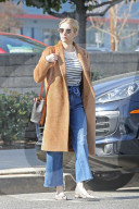Hollywood actress and singer Emma Roberts purchases a special edition of Los Angeles magazine, pays tribute to late basketball legend Kobe Bryant.