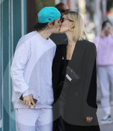 Justin Bieber And Hailey Baldwin Engage In Steamy Smooch Session For The Cameras