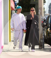 Justin Bieber And Hailey Baldwin Engage In Steamy Smooch Session For The Cameras