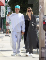 Justin Bieber And Hailey Baldwin Engage In Steamy Smooch Session For The Cameras