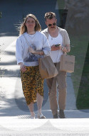 Breaking Bad star Aaron Paul and his actress wife Lauren Parsekian look fashionable and relaxed whilst perfume shopping in Los Feliz.