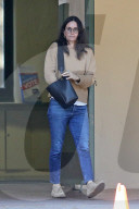 Courteney Cox cuts a casual figure as she runs errands in Pacific Palisades on Saturday afternoon [March 7.]