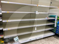 Empty shelves in a Tesco supermarket in east London after shoppers panic buy essential items as they prepare for a potential UK lockdown for an oncoming coronavirus outbreak and self isolation.
